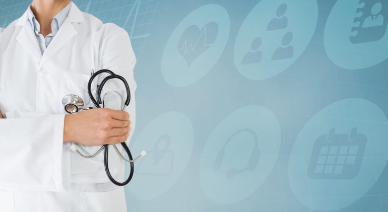 Doctor standing with arms crossed against hospital icons in background depression in adolescence definition