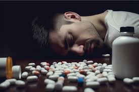 A man sleep with many pills